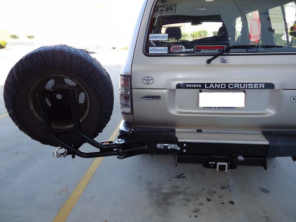 OUTBACK ACCESSORIES' SINGLE WHEEL CARRIER TO SUIT LAND CRUISER 80