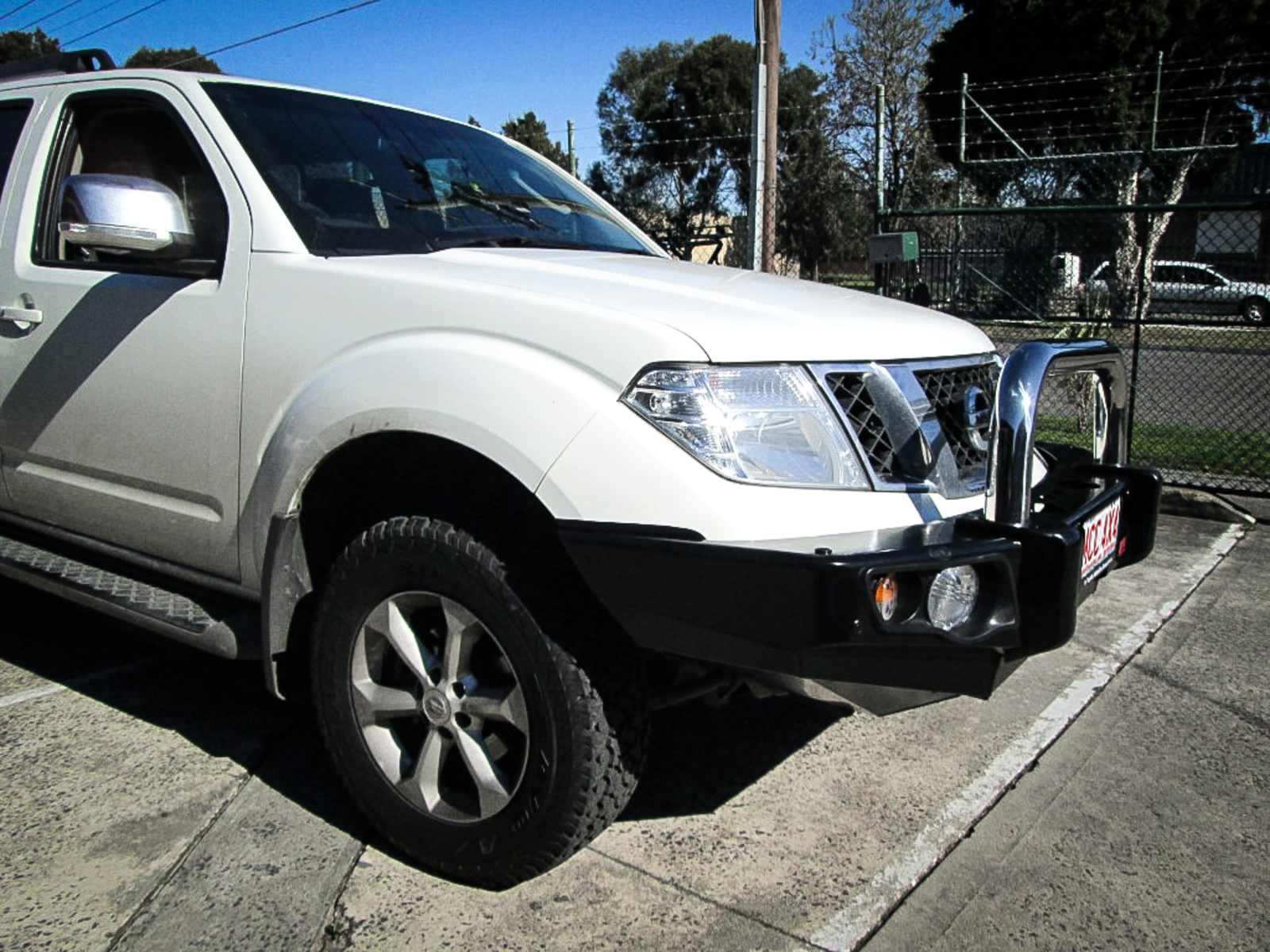 MCC FALCON STAINLESS SINGLE LOOP W/ FOGS AND PLATES TO SUIT NISSAN NAVARA D40 2011-2014 (AFRICA, SPAIN STX) & PATHFINDER R51 11-13 (SMOOTH)